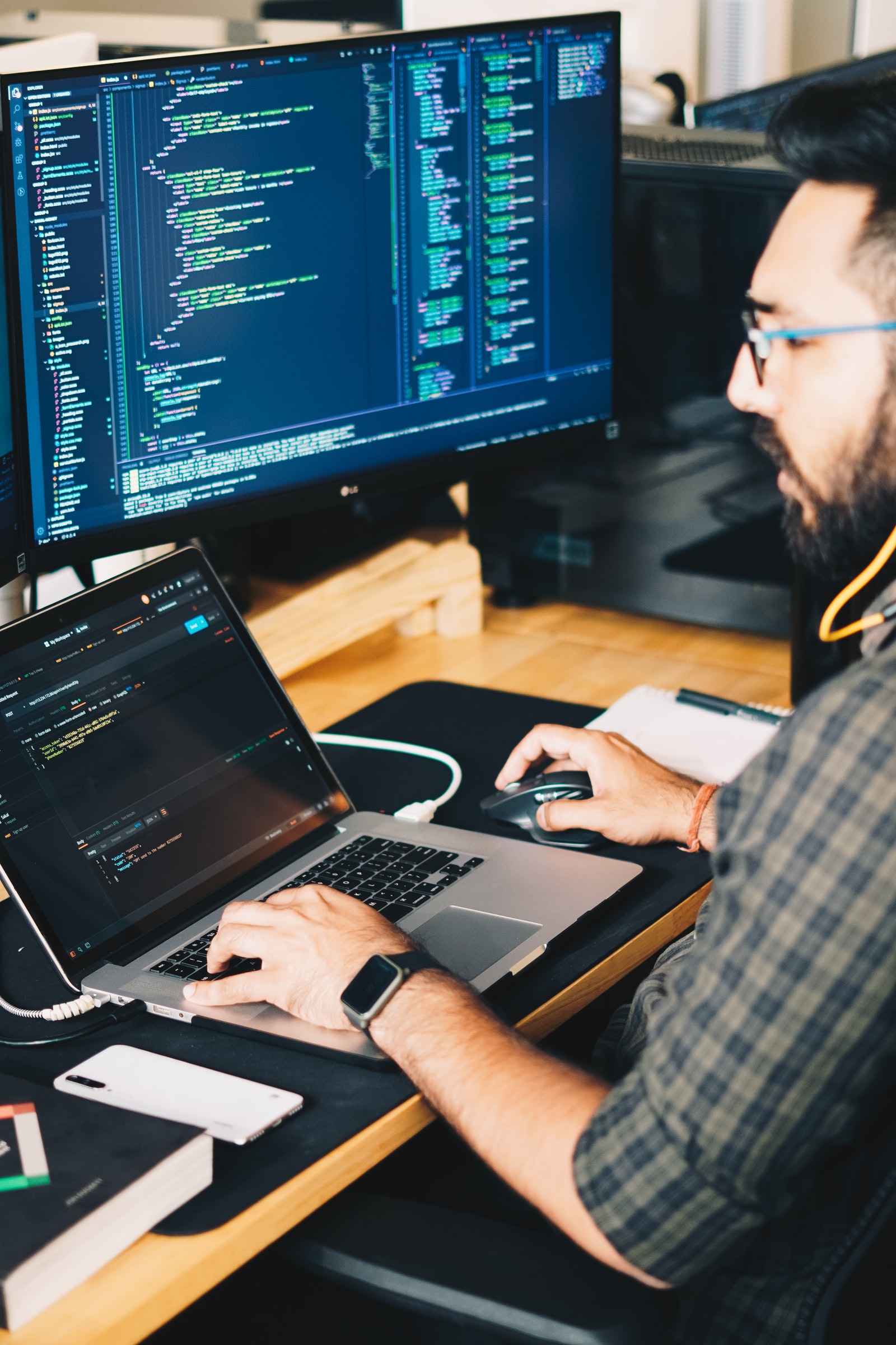software developer working at computer
