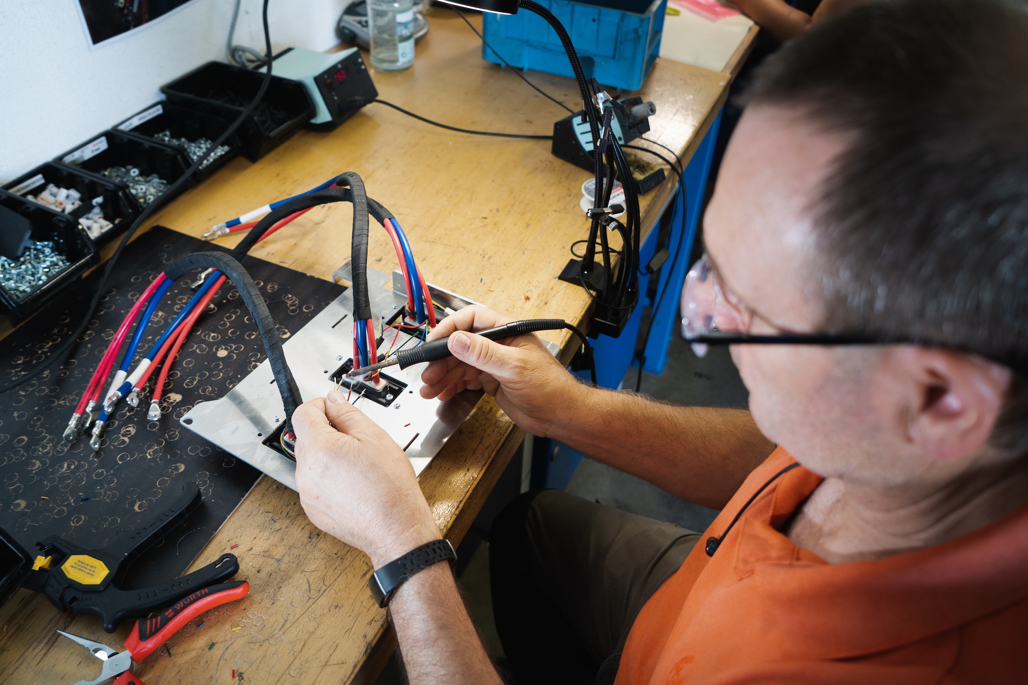 engineer in lab soldering